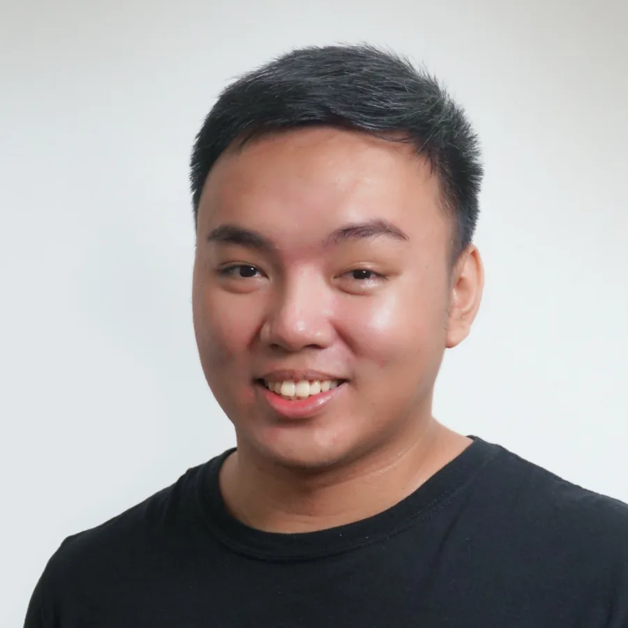 JP Dionisio smiling, wearing a black shirt